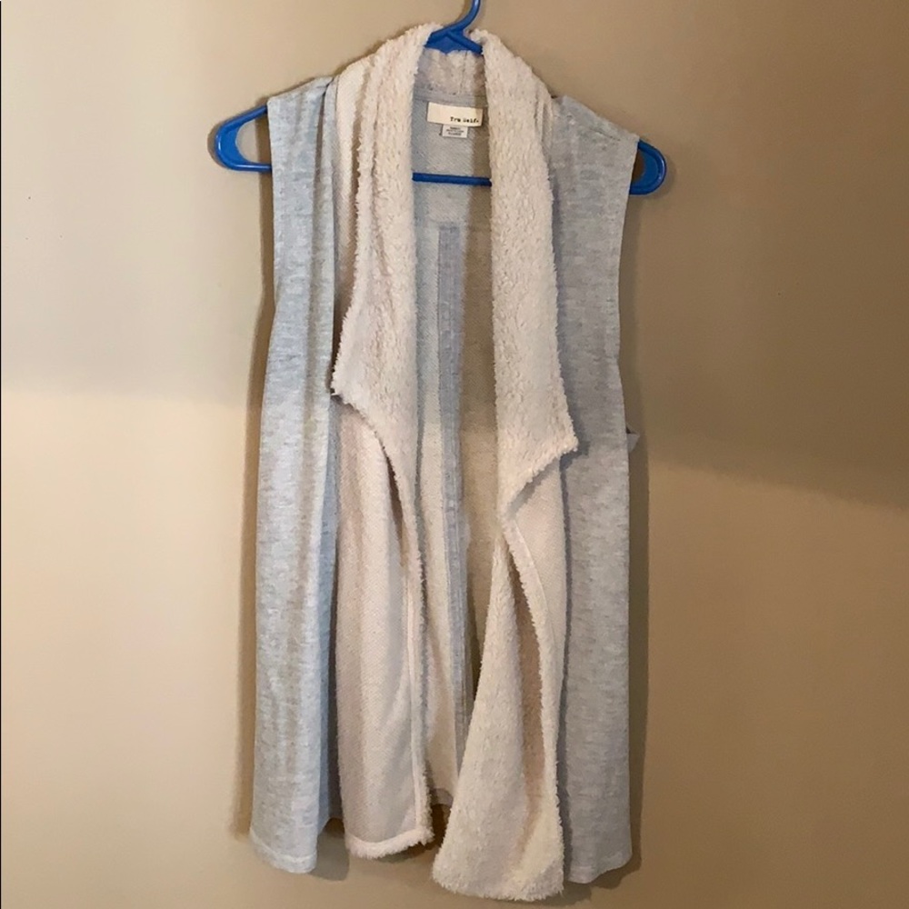 Soft fuzzy open front vest. Only worn twice.